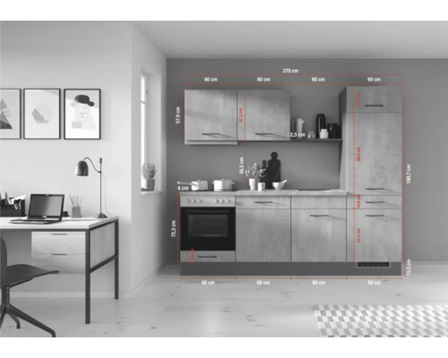 Küchenzeile mit Ober- und Unterschränken sowie Elektroherd mit Backofen und angrenzendem Schreibtisch