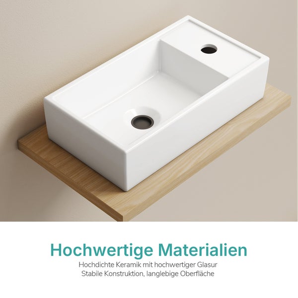 Rechteckiges Aufsatzwaschbecken aus Keramik auf einer Holzkonsole für das Badezimmer.