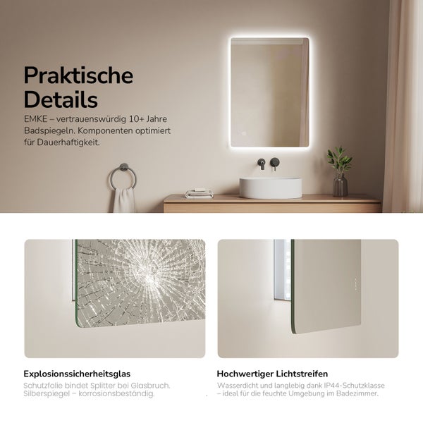 Beleuchteter EMKE Badezimmerspiegel mit Sicherheitsglas und IP44 Schutzklasse für Feuchträume, montiert über einem Waschtisch.