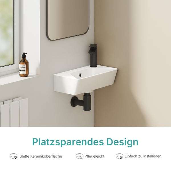 Wandhänge-Handwaschbecken aus Keramik mit Armatur und Siphon im modernen Badezimmer mit platzsparendem Design, pflegeleicht und einfach montiert.