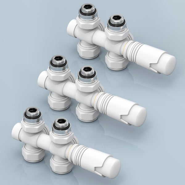 Drei weiße Heizkreisverteiler im Detail