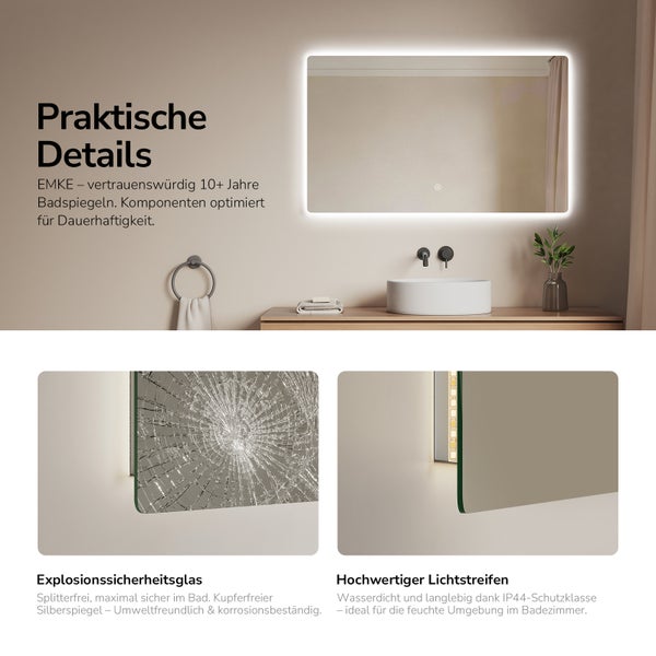 Detailaufnahme eines Badezimmers mit beleuchtetem Spiegel, Waschbecken und Accessoires, die die Sicherheitsmerkmale hervorhebt: Splitterschutzglas und wasserdichte Lichtstreifen