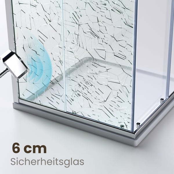 Nahaufnahme einer Duschkabine mit Sicherheitsglas, das durch einen Hammeraufprall zerbrochen ist
