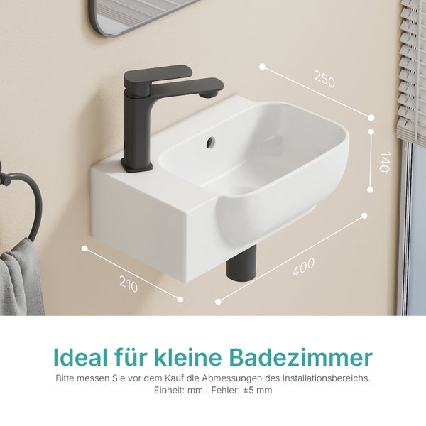 Auf dem Bild ist ein weißes Aufsatzwaschbecken mit einer grauen Armatur zu sehen, inklusive Maßangaben.