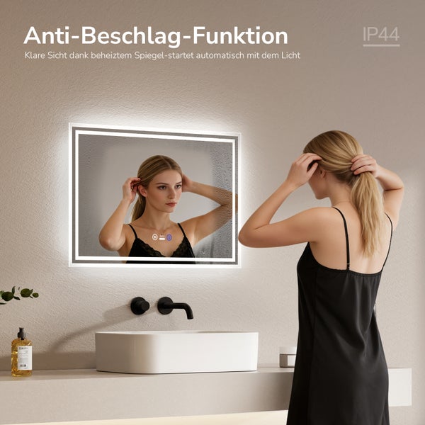 Beleuchteter Badezimmerspiegel mit Anti Beschlag Heizfunktion und IP44 Schutzklasse im modernen Badezimmer mit Waschbecken