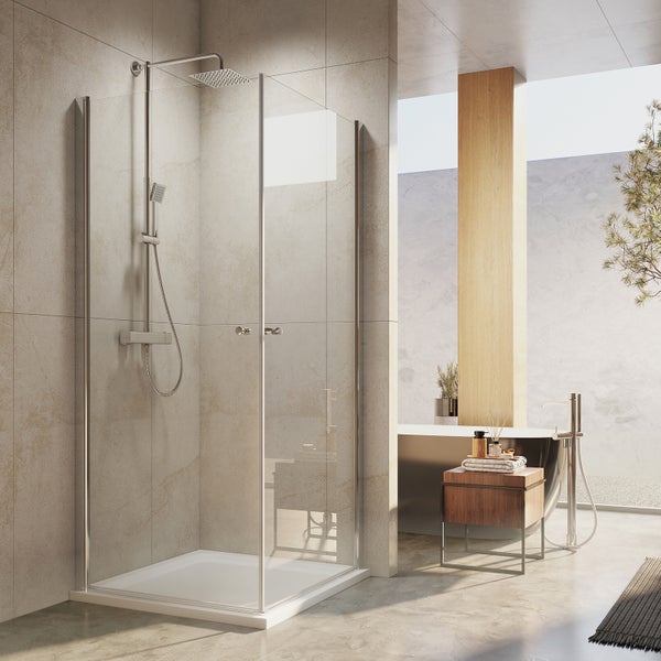 Badezimmer mit Duschkabine, Badewanne und Waschtisch