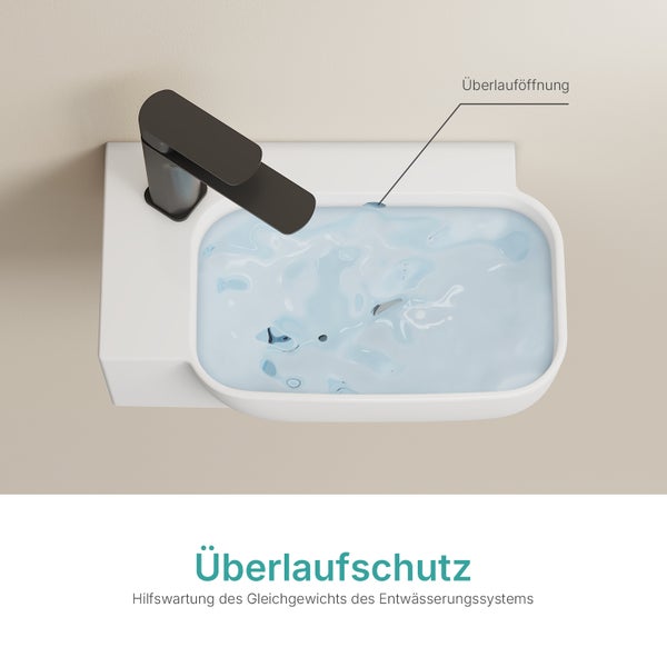 Aufsicht auf ein Waschbecken mit Überlaufschutz und einem Wasserhahn