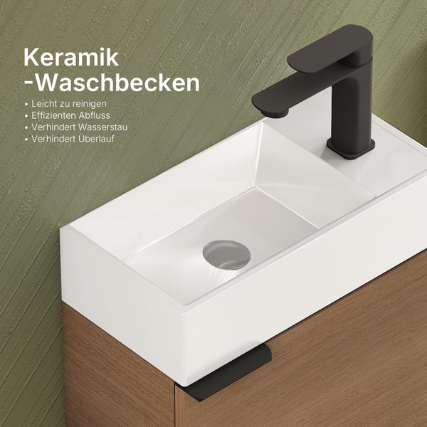 Keramikwaschbecken mit Armatur auf Unterschrank