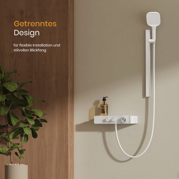 Duschsystem mit Kopfbrause und Brauseschlauch an der Wand