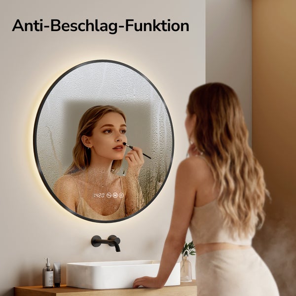 Runder Badezimmerspiegel mit LED Beleuchtung und Anti Beschlag Funktion über einem Waschbecken.