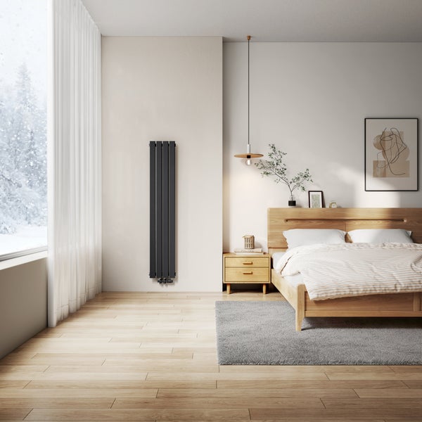 Modernes Schlafzimmer mit Designheizkörper, Holzbett und Winterlandschaft