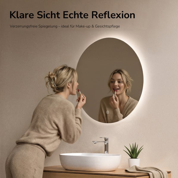 Runder LED Badezimmerspiegel mit indirekter Beleuchtung über einem Waschbecken in modernem Badezimmer.