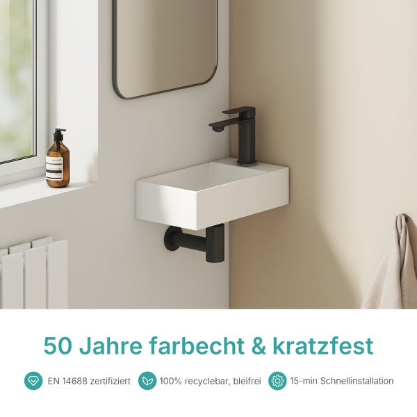 Waschtisch mit Armatur und Siphon im modernen Badezimmer