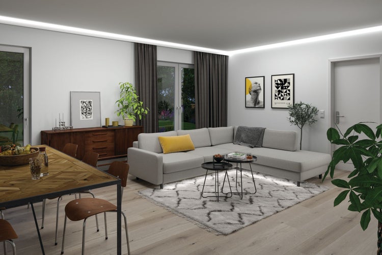 Wohnzimmer mit Ecksofa, Teppich, Holztisch und Dekoration