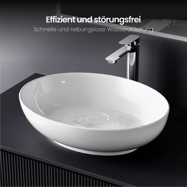 Ovales Aufsatzwaschbecken mit Armatur auf Unterschrank