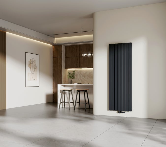 Modernes Wohnzimmer mit Heizkörper, Küchenzeile und minimalistischem Dekor.