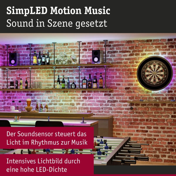 Barraum mit Regalen, Getränken, Dartscheibe und Tischfußball mit indirekter LED Beleuchtung