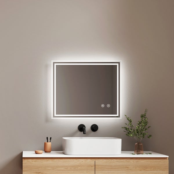 Rechteckiger Badezimmerspiegel mit LED Beleuchtung, integrierter Heizmatte gegen Beschlagen und Touch Bedienung über dem Waschtisch.