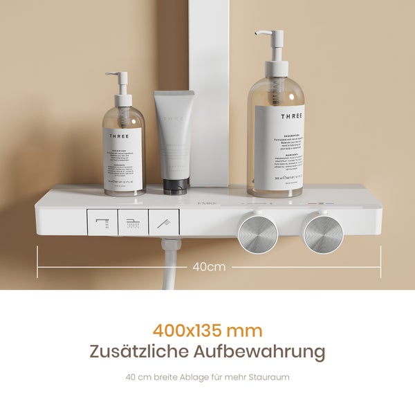 Duscharmatur mit integrierter Ablagefläche für zusätzliche Aufbewahrung, 400 mal 135 Millimeter, mit zwei Drehreglern und Funktionstasten.