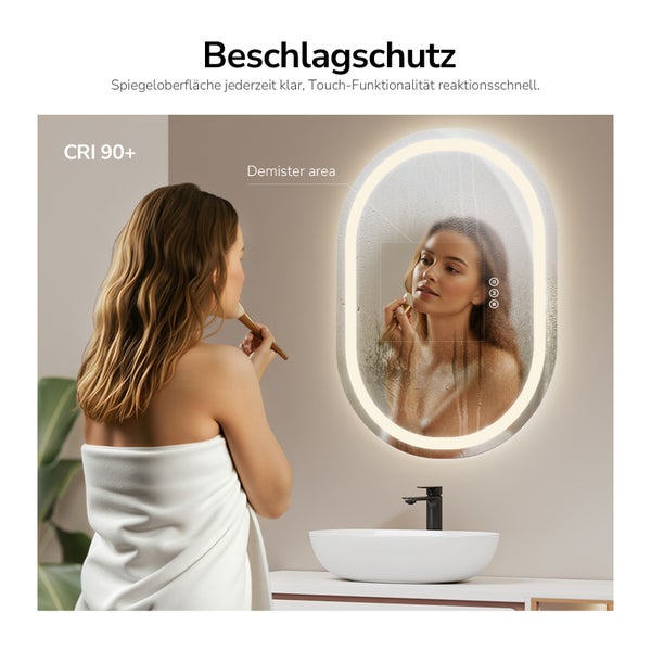 Frau vor einem ovalen Spiegel mit Beschlagschutz und LED-Beleuchtung in einem Badezimmer