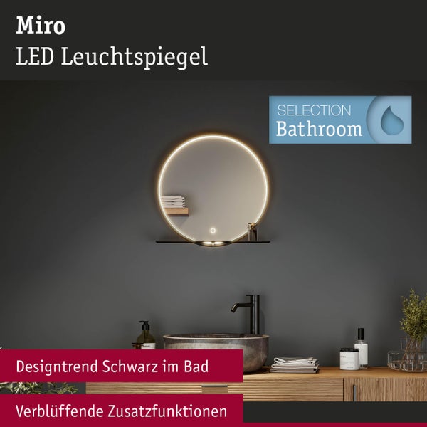 Miro LED-Leuchtspiegel im Badezimmer mit Waschbecken und Accessoires