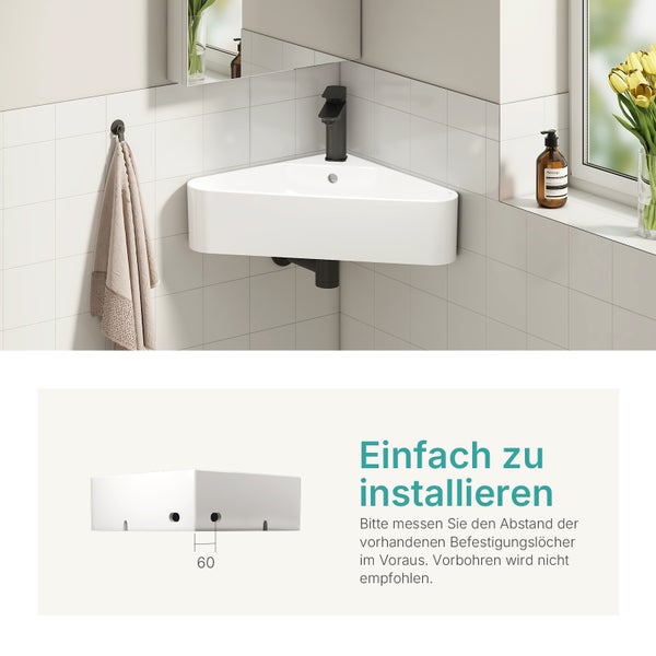 Eckwaschbecken im Badezimmer mit Armatur