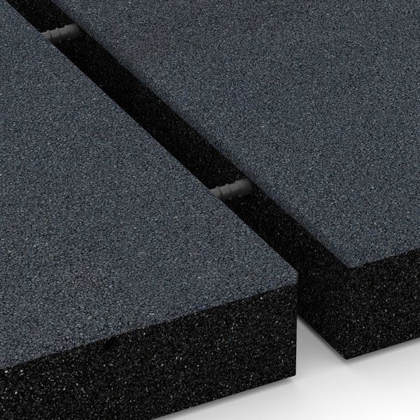 Detailaufnahme von Verbundpflastersteinen aus Gummi mit Verbindungselementen