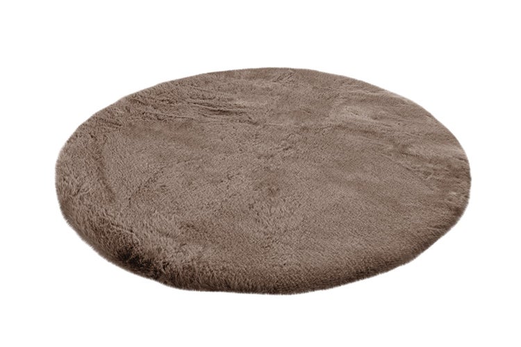 Runder brauner Kunstfellteppich mit weicher Oberfläche.
