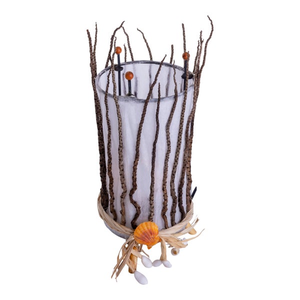 Dekorative Glasvase mit Zweigen und Muscheln