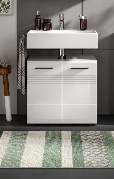 Waschtisch mit Unterschrank und Handtuch