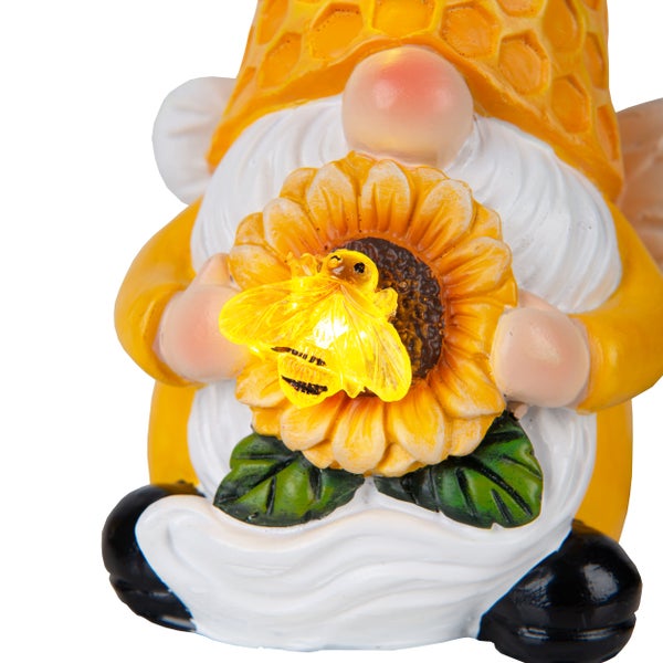 Gartenzwerg mit Sonnenblume und Bienenfigur
