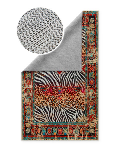 Teppich mit Zebra- und Leopardenmuster, orientalischer Bordüre und rutschhemmender Rückseite mit Detailansicht.