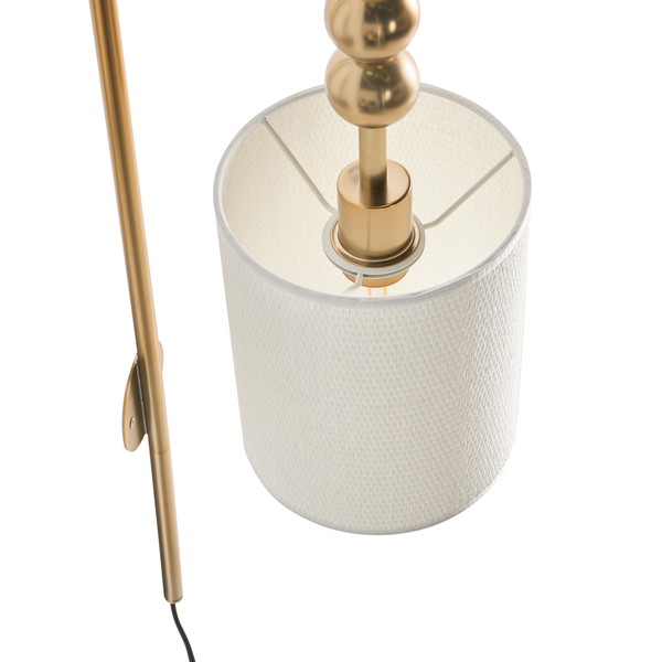 Stehlampe mit Lampenschirm und goldenem Gestell