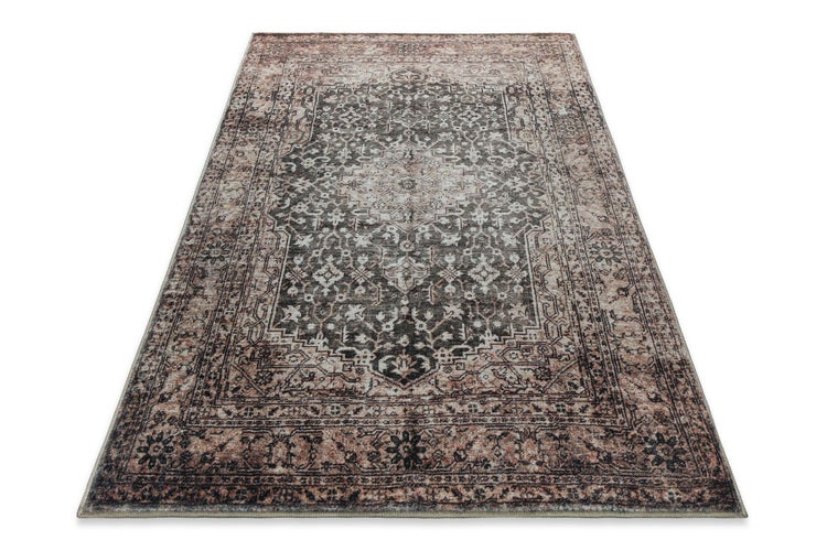Rechteckiger Orientteppich im Vintage-Design mit ornamentalem Muster und zentralem Medaillon.