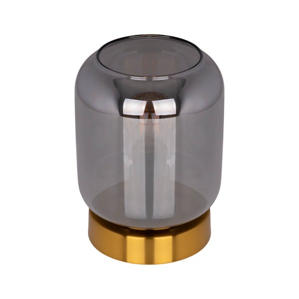 Dekorative Tischleuchte mit einem Lampenschirm aus Glas und einem Lampenfuß.