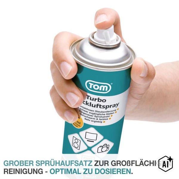 Hand hält eine Dose TOM Turbo Druckluftspray zur berührungslosen Staubentfernung an schwer zugänglichen Stellen.
