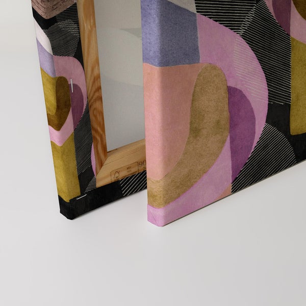 Nahaufnahme eines Leinwanddrucks mit abstraktem Design und Holzrahmen