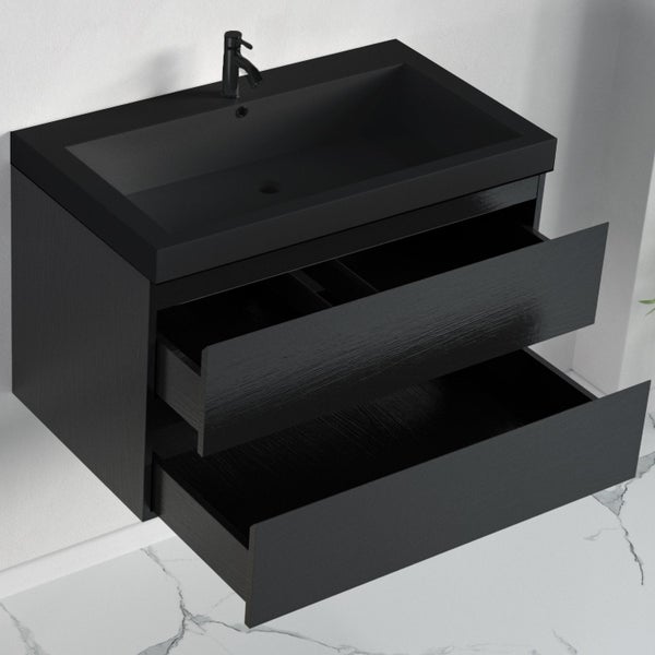 Wandhängender Waschtischunterschrank in Schwarz mit zwei geöffneten Schubladen, integriertem Waschbecken und Armatur.
