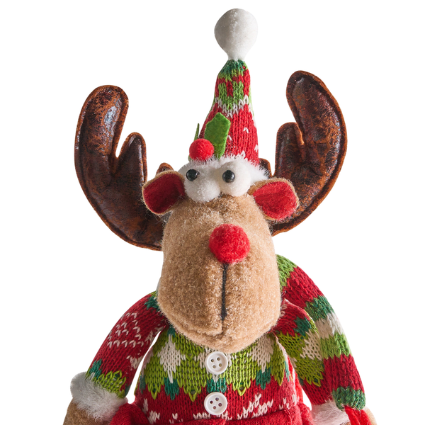 Dekorativer Elch mit Mütze und Geweih als Weihnachtsdekoration