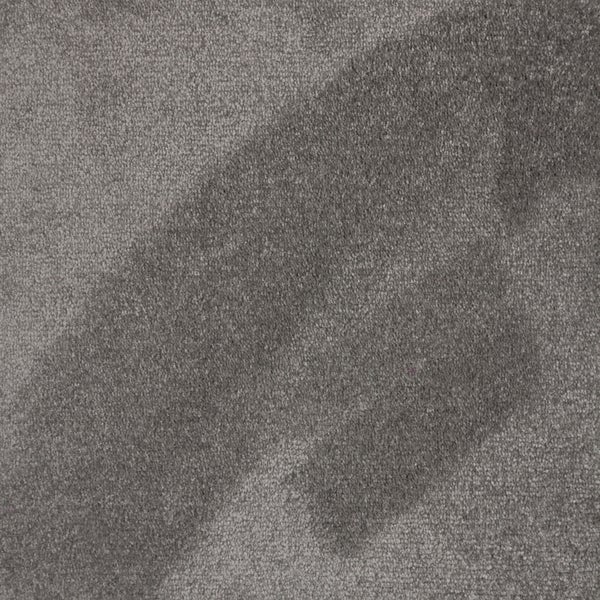 Nahaufnahme eines kurzflorigen Teppichbodens mit feiner Oberflächenstruktur