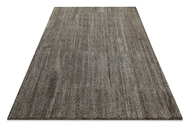 Strukturierter Teppich mit meliertem Design und feiner Weboptik für Wohnbereiche.