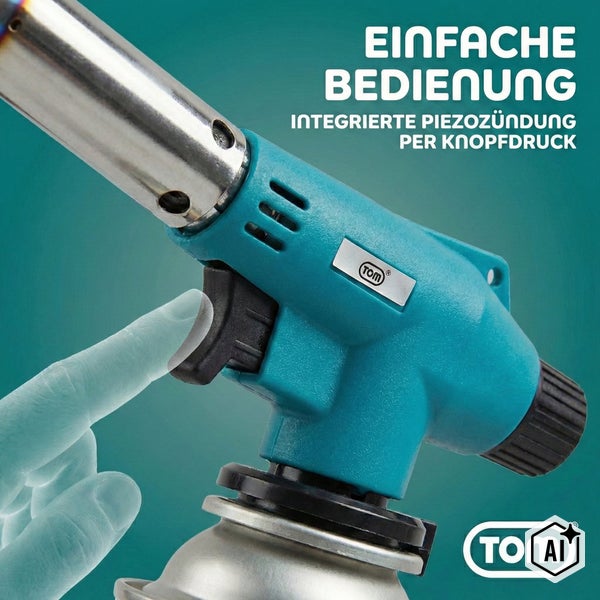 TOM Gasloetbrenner mit Piezozündung und Knopfbedienung auf eine Gaskartusche aufgesetzt.