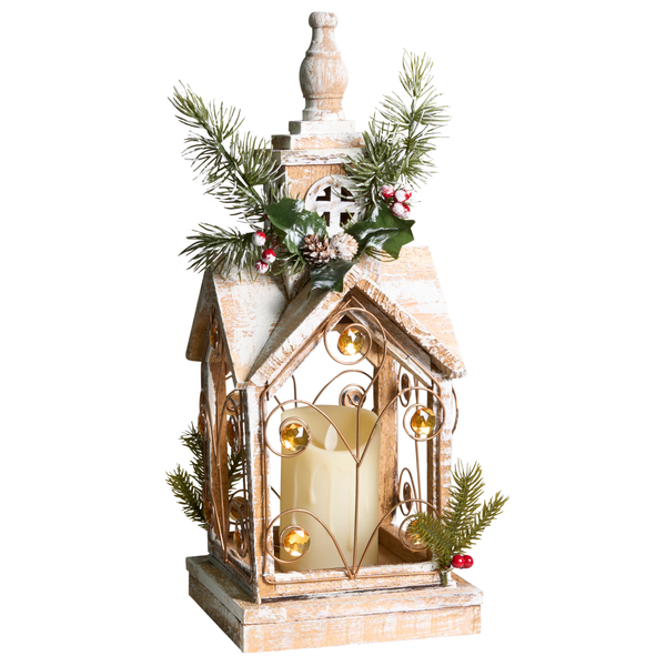 Dekorative Laterne in Hausform mit LED Kerze auf einem Tisch, weihnachtliche Szene.