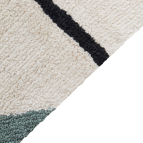 Detailansicht eines Teppichs mit geometrischem Muster