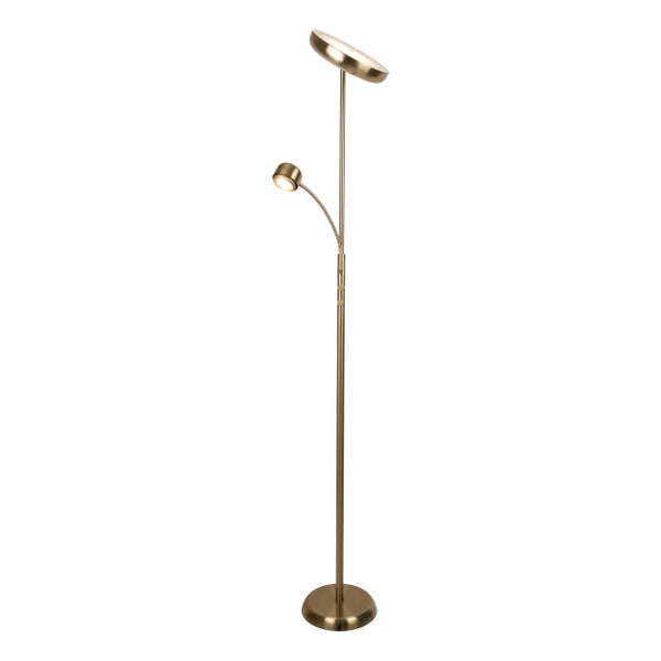 Detailaufnahme einer goldenen Stehlampe.