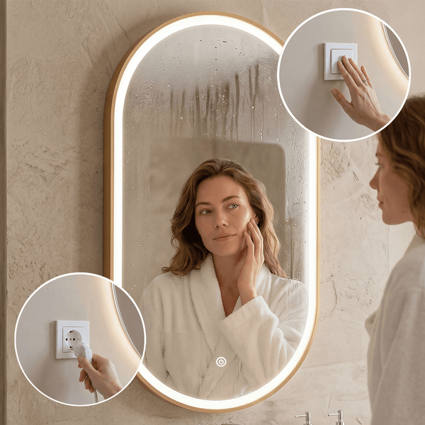 Ovaler Badezimmerspiegel mit LED Beleuchtung in einem modernen Badezimmer, Details zeigen die Bedienung per Lichtschalter und Steckdosenanschluss.