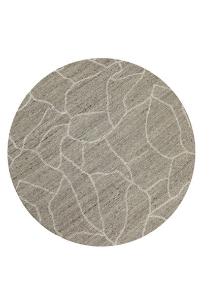 Runder Teppich mit abstraktem Linienmuster in Beige und Grau.