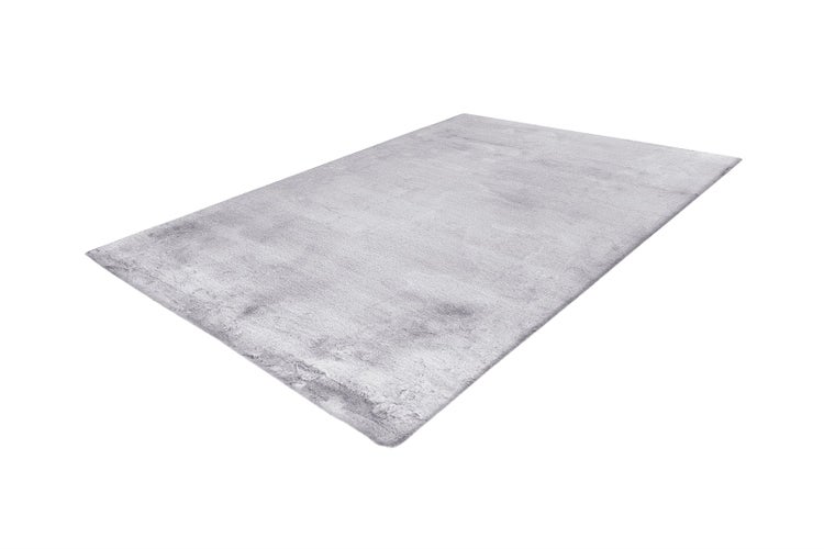 Rechteckiger, hochfloriger Teppich in Grau mit weicher Oberfläche.