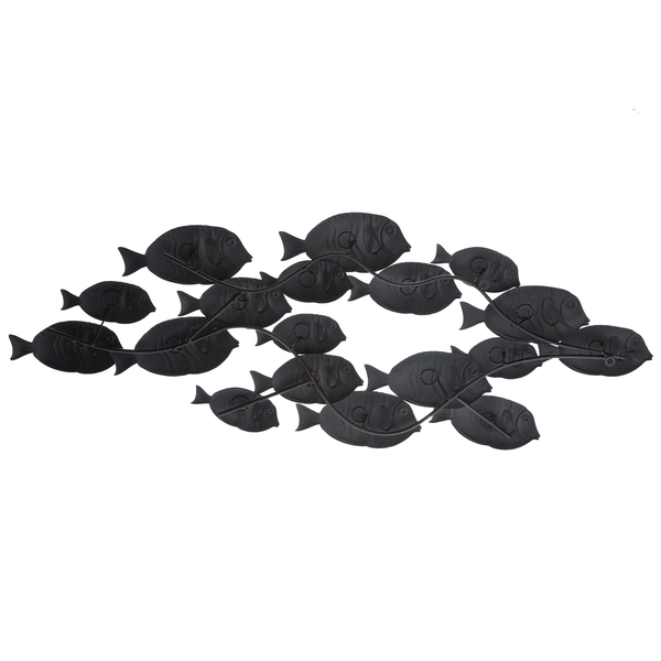 Dekoratives Arrangement mit Kissen und Überwurf auf einem Sofa