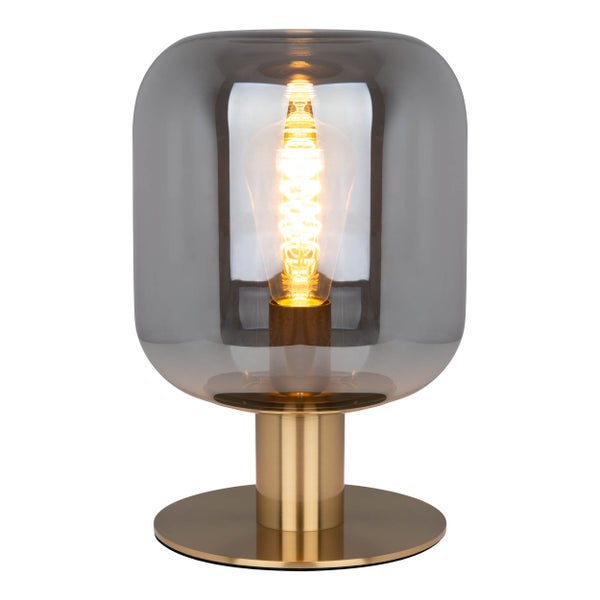 Dekorative Tischleuchte mit einem Lampenschirm aus Glas und einem Metallsockel.